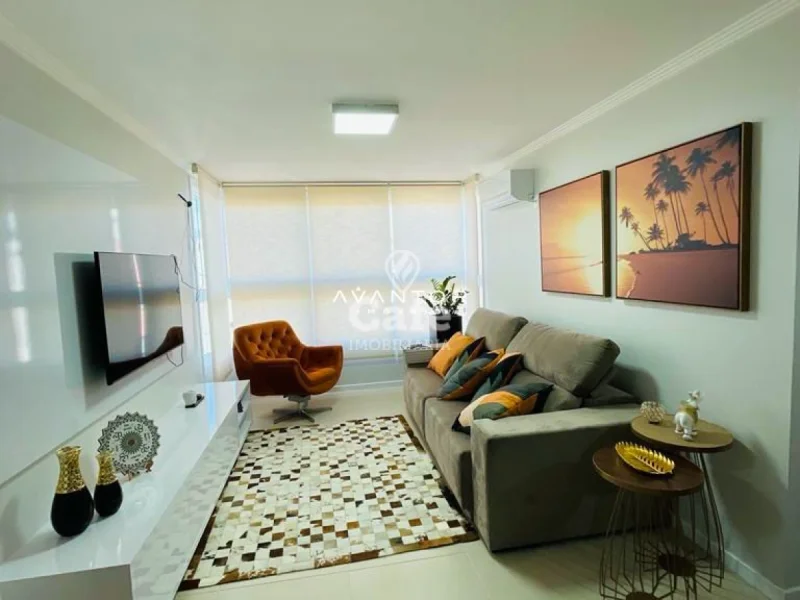Sala de estar com sofá e poltrona — Apartamento à venda no Residencial Draco, em Nossa Senhora das Dores, Santa Maria/RS