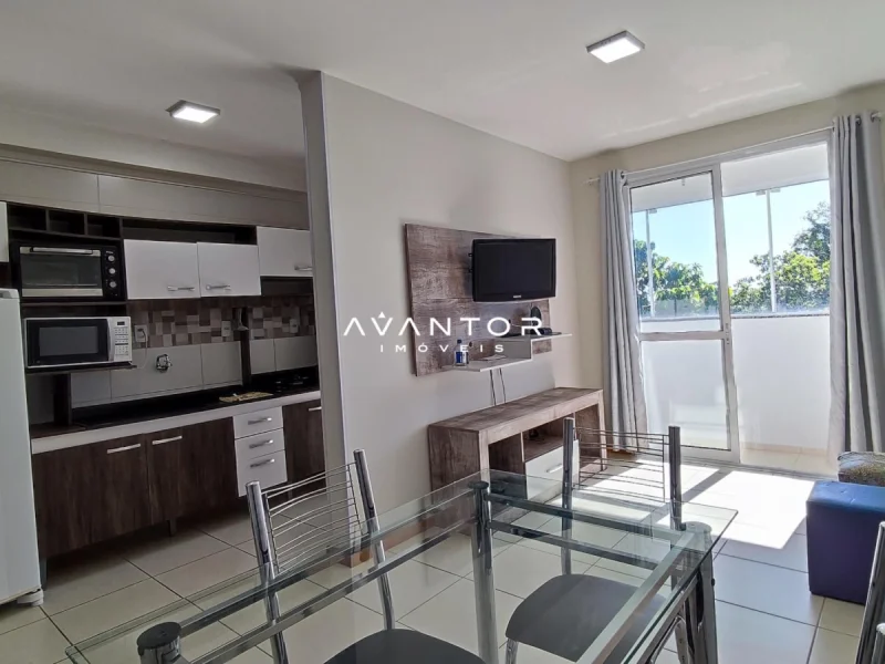 Sala integrada com cozinha e sacada — Apartamento à venda no Residencial Malawi, em Nossa Senhora do Rosário, Santa Maria/RS