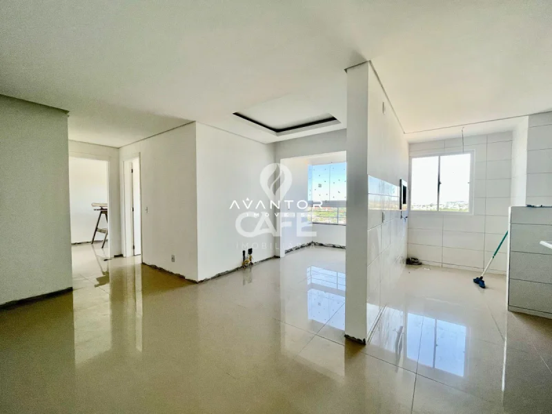 Sala integrada com cozinha e sacada — Apartamento à venda no Residencial Bella Morada, em Bonfim, Santa Maria/RS