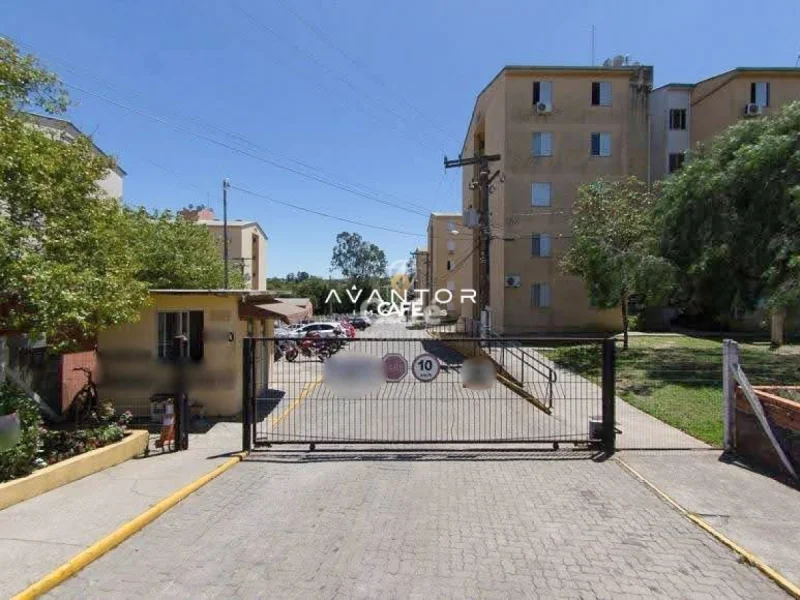 Fachada do condomínio com portaria — Apartamento à venda no Condomínio Residencial Moradas do Parque I, Santa Maria