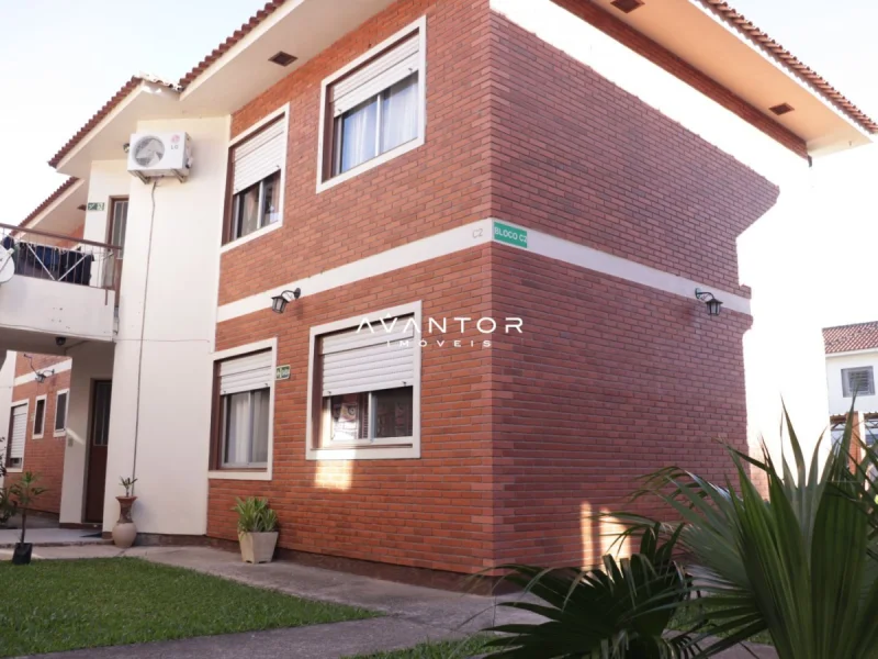 Fachada da casa com área externa — Apartamento à venda no Residencial Arco Verde, em Pinheiro Machado, Santa Maria/RS