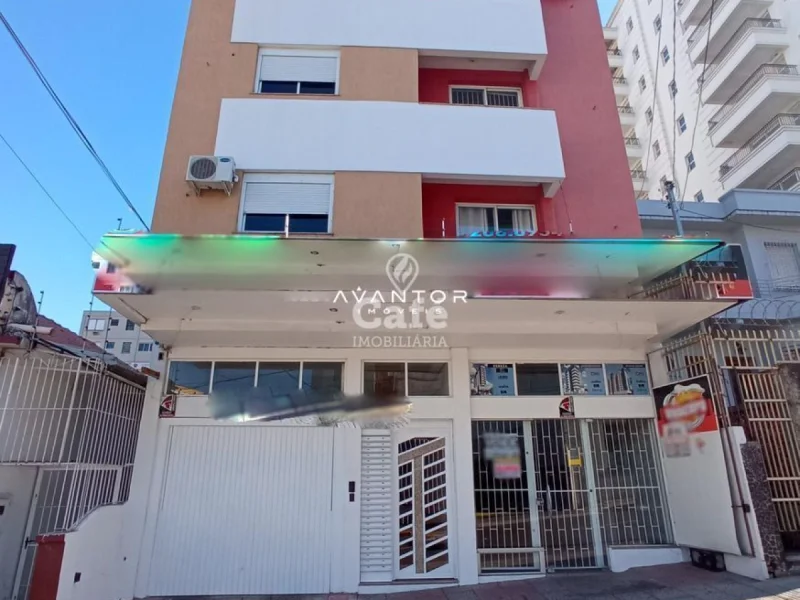 Fachada do edifício com lojas no térreo — Apartamento com 1 quarto à venda no Edifício Toronto, em Centro, Santa Maria/RS