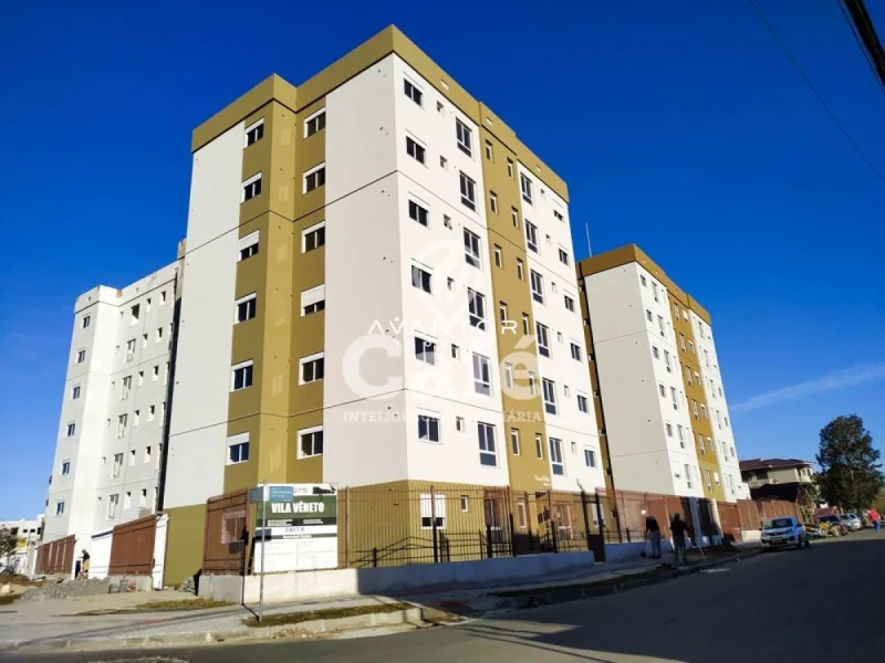 Fachada do prédio com cores contrastantes — Apartamento à venda no Residencial Vila Vêneto, em Camobi, Santa Maria/RS