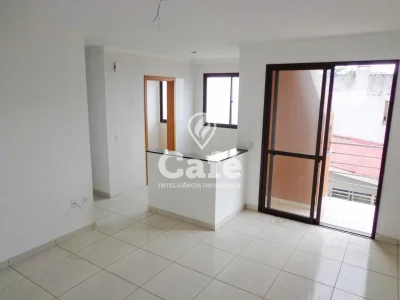 Sala com cozinha integrada e sacada — Apartamento à venda e para alugar no Residencial Bem Morar, Santa Maria