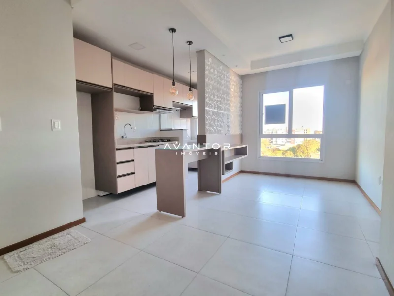 Cozinha integrada à sala com bancada — Apartamento à venda no Residencial Vila Vêneto, em Camobi, Santa Maria/RS