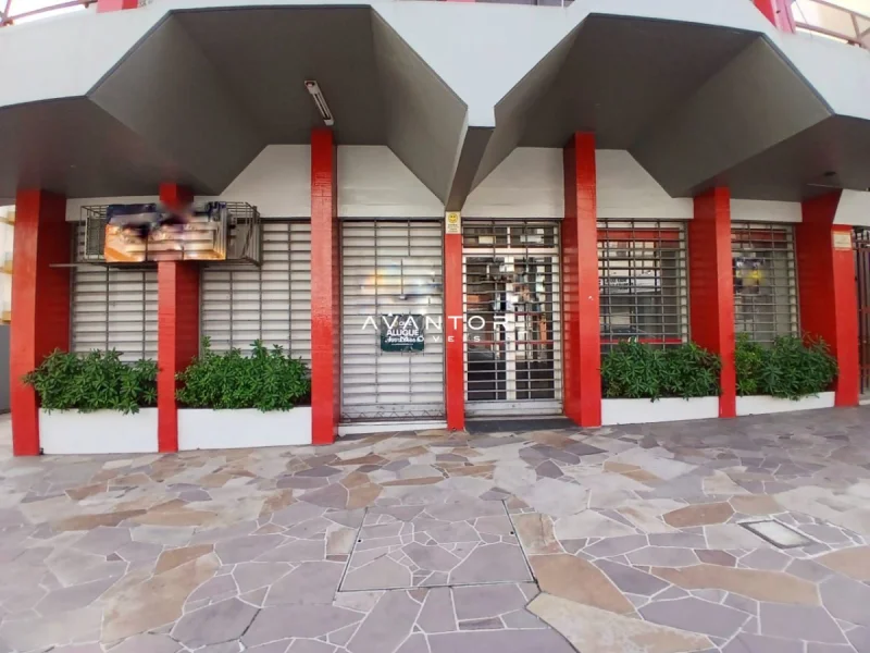 Fachada comercial com colunas vermelhas — Sala Comercial para alugar no Edifício Mediterranee, em Bonfim, Santa Maria/RS