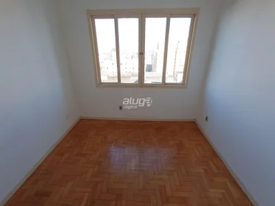 Apartamento no Centro De 2 Dormitórios, Sala Ampla, Banheiro Social, Cozinha, Banheiro Aux — Apartamento para alugar no Edifício Pampa
