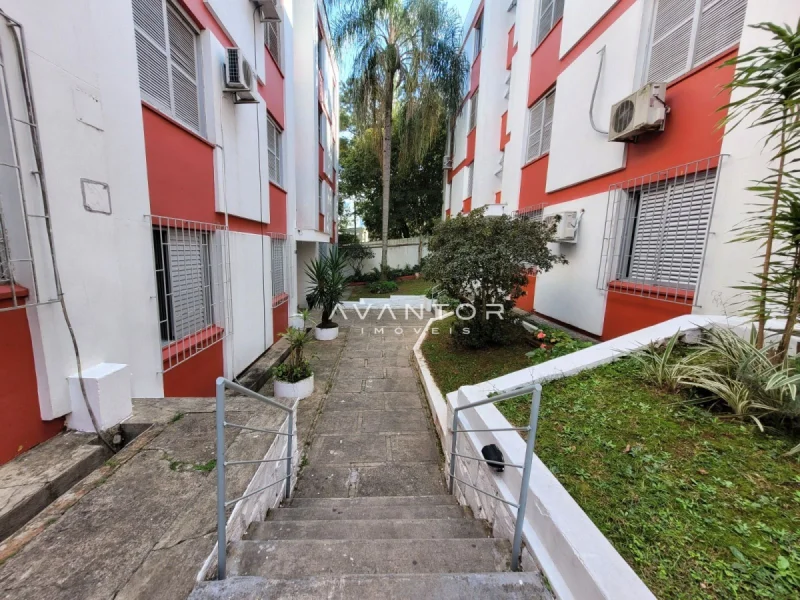 Hall de entrada com área comum e paisagismo — Apartamento com 2 quartos à venda em Centro, Santa Maria/RS
