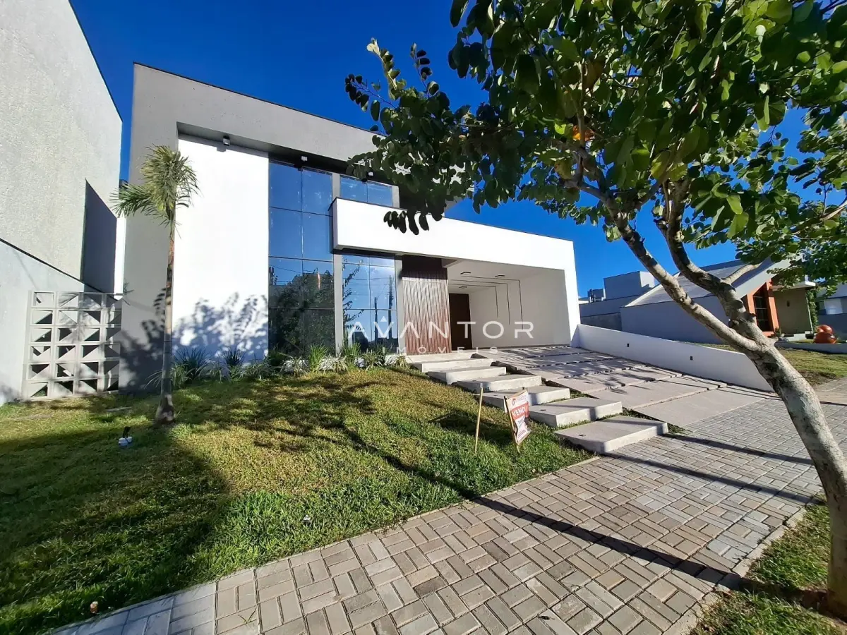 Fachada da casa com garagem — Casa de Condomínio com 3 quartos à venda no Cidade Universitária, em Camobi, Santa Maria/RS