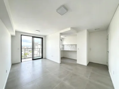 Sala de estar integrada à cozinha com sacada — Apartamento à venda no Residencial Livty, em Centro, Santa Maria/RS