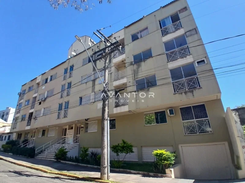 Apartamento Central de 2 dormitórios, sala de estar, banheiro social, cozinha e área de se — Apartamento à venda no Edifício Maison Saint Louis