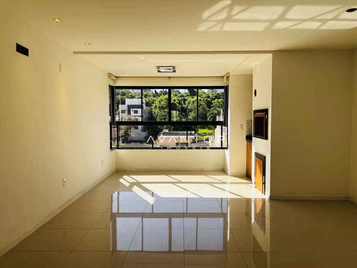 Sala de estar com sacada e vista externa — Apartamento à venda no Residencial Villa Lobos, Santa Maria