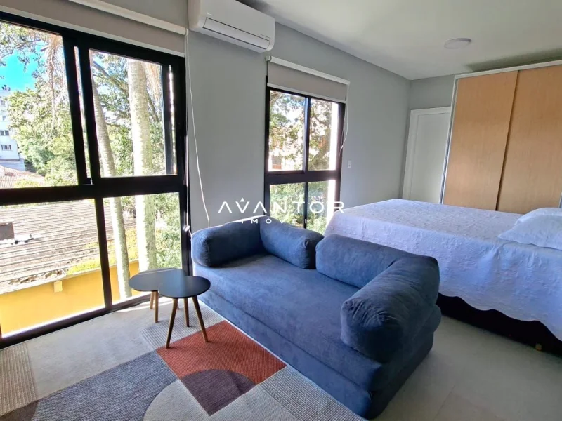Dormitório com sacada e vista para áreas verdes — Apartamento à venda no Camobi Smart Living, em Camobi, Santa Maria/RS