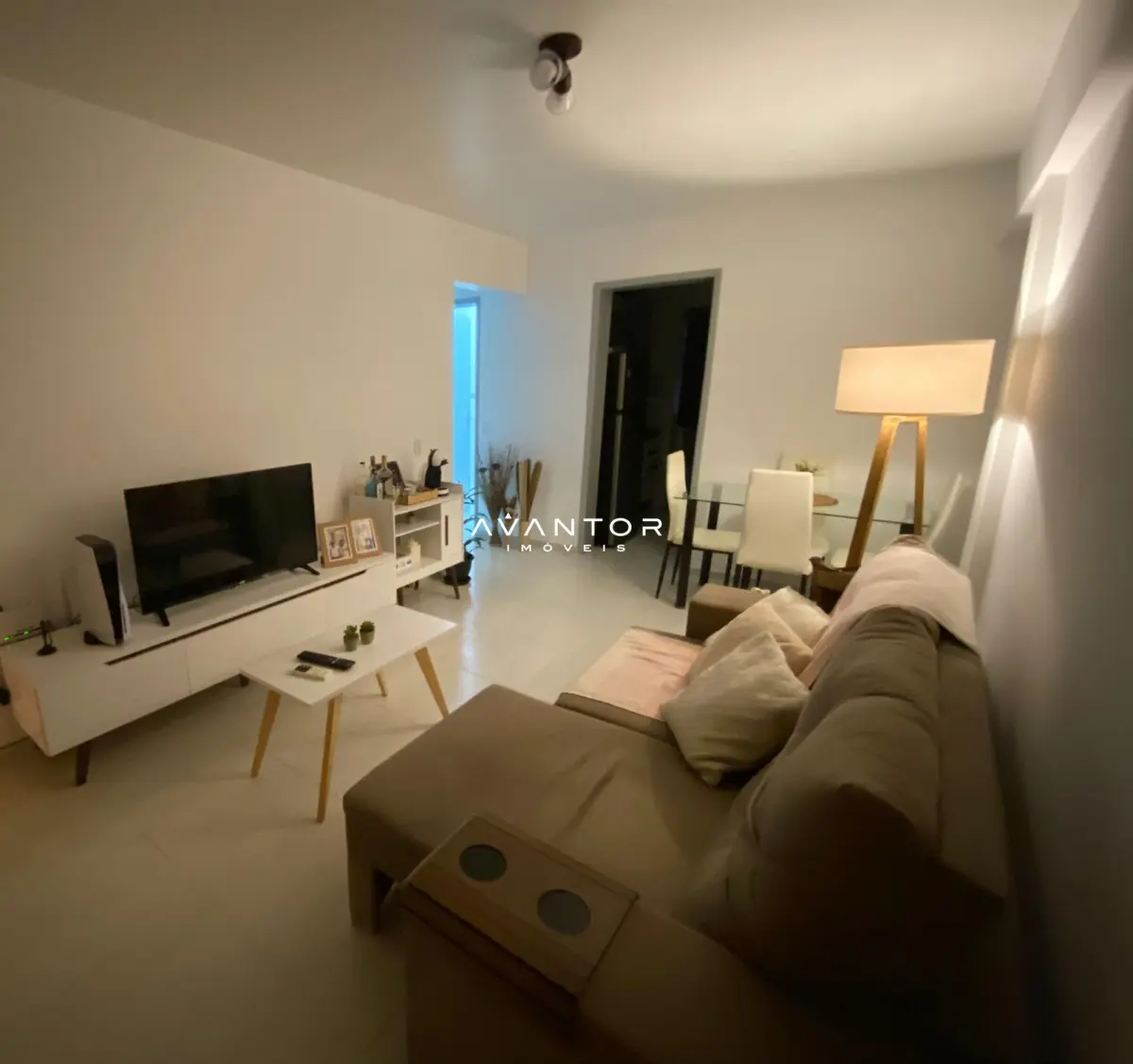 Sala de estar com tv e sofá — Apartamento com 2 quartos à venda em Prado, Sant'Ana do Livramento/RS