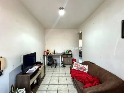 Sala de estar integrada à cozinha — Apartamento com 2 quartos à venda em Centro, Santa Maria/RS