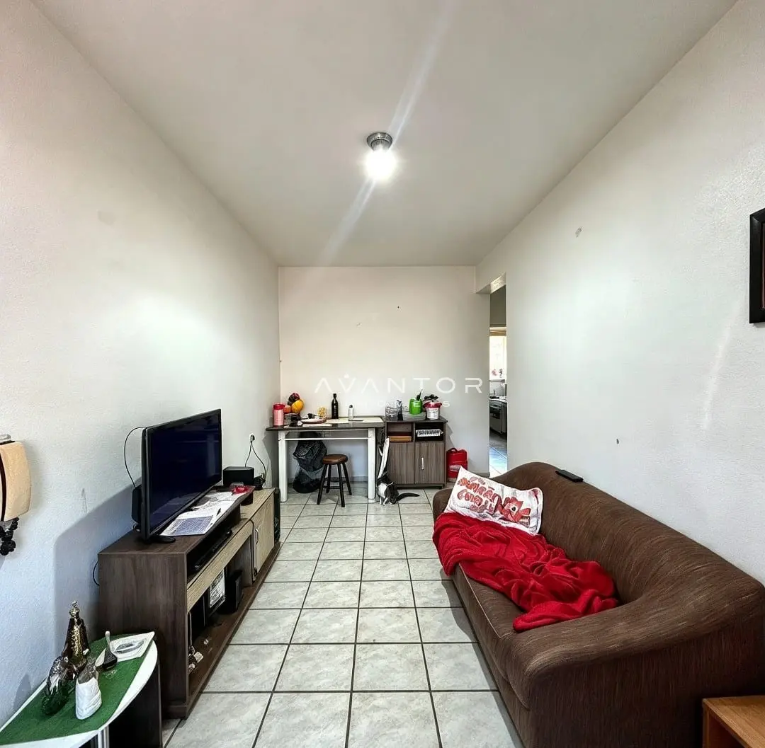 Sala de estar integrada à cozinha — Apartamento com 2 quartos à venda em Centro, Santa Maria/RS