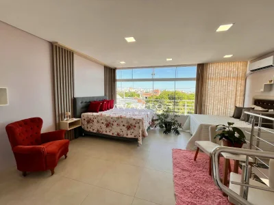 Suíte com sacada e vista da cidade — Casa com 4 quartos à venda em Nossa Senhora do Perpétuo Socorro, Santa Maria/RS