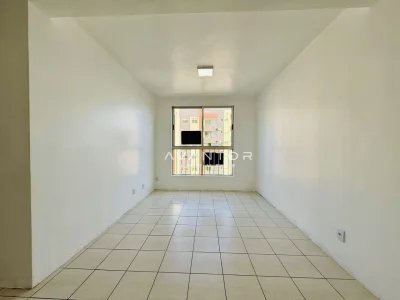 Sala com piso em cerâmica — Apartamento à venda no Residencial Ferrara, em Presidente João Goulart, Santa Maria/RS