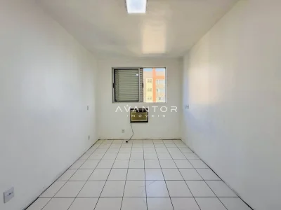 Dormitório com piso em cerâmica — Apartamento à venda no Residencial Ferrara, em Presidente João Goulart, Santa Maria/RS