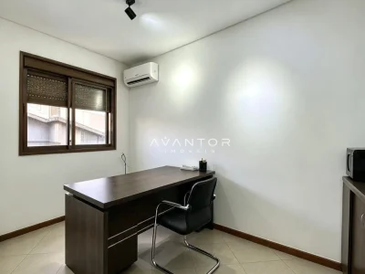 Escritório com mesa e ar condicionado — Apartamento com 2 quartos à venda no edificio monalisa, em Centro, Santa Maria/RS