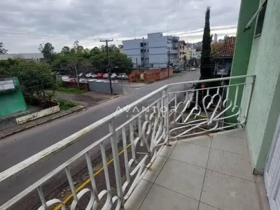 Sacada com vista para rua e bairro — Apartamento com 3 quartos para alugar em Nossa Senhora de Lourdes, Santa Maria/RS