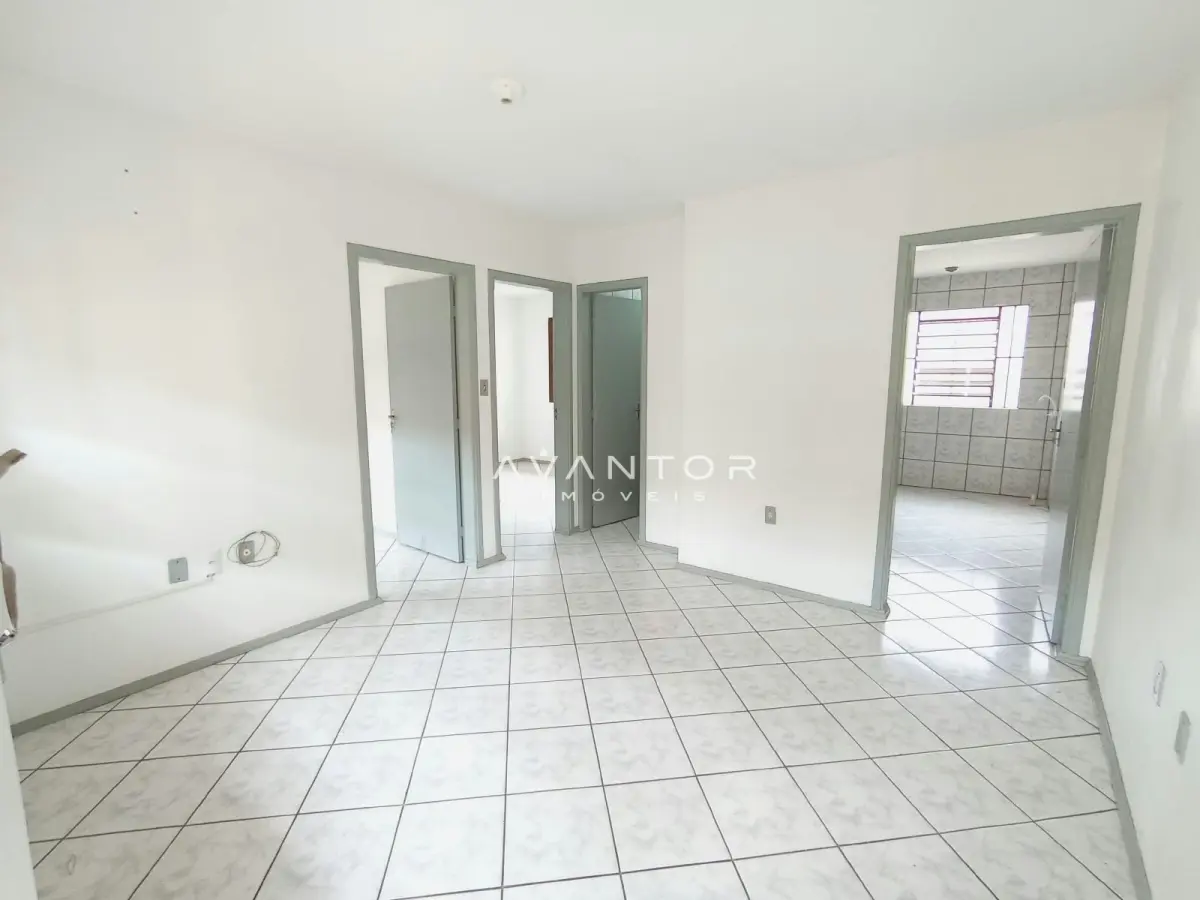 Sala de estar integrada à cozinha — Apartamento à venda no Residencial Arco Verde, em Pinheiro Machado, Santa Maria/RS