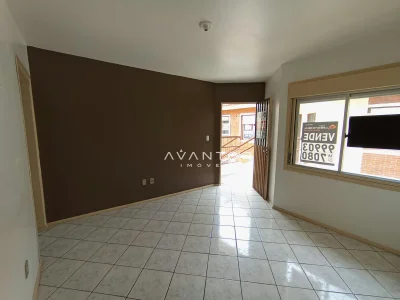 Sala de estar com acesso à sacada — Apartamento à venda no Residencial Arco Verde, em Pinheiro Machado, Santa Maria/RS