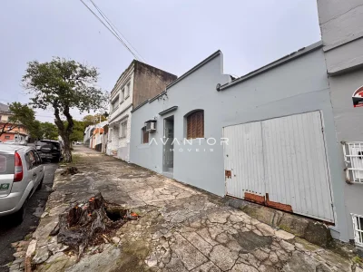 Fachada da casa com garagem — Terreno à venda em Nossa Senhora do Rosário, Santa Maria/RS