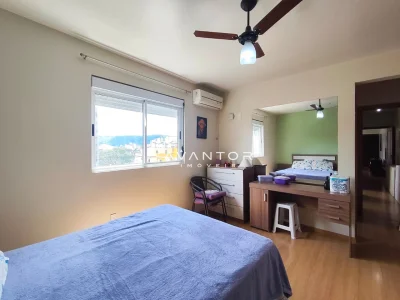 Dormitório com vista para a cidade — Apartamento para alugar no Edifício Montana Residencial, Santa Maria