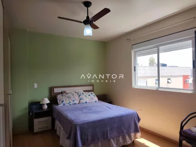 Dormitório com janela e ventilador de teto — Apartamento para alugar no Edifício Montana Residencial, Santa Maria