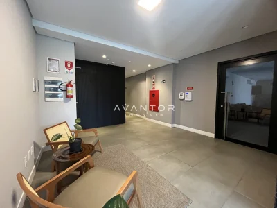 Hall de entrada com área de espera — Apartamento à venda no Residencial Fernando Pessoa, Santa Maria
