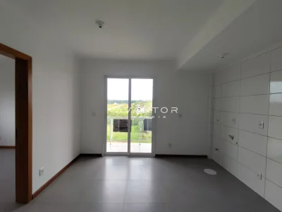 Sala com sacada e armários planejados — Apartamento com 1 quarto para alugar em Camobi, Santa Maria/RS