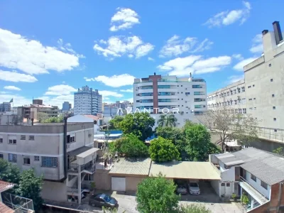 Vista da janela com área comum do condomínio — Apartamento para alugar no Residencial Dulce Fração, Santa Maria