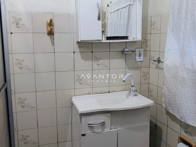 Banheiro com pia e armário — Casa com 3 quartos à venda em Passo D'Areia, Santa Maria/RS