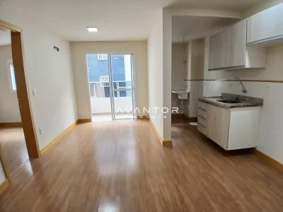 Sala integrada à cozinha com sacada — Apartamento para alugar no Residencial Espírito Santo, em Centro, Santa Maria/RS