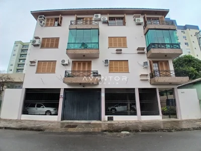 Fachada do prédio com sacadas e garagens — Apartamento à venda no Residencial Lazaro Levi Lapuente, em Bonfim, Santa Maria/RS