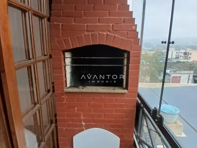 Sacada com churrasqueira integrada e vista — Apartamento à venda no Residencial Lazaro Levi Lapuente, em Bonfim, Santa Maria