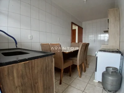 Cozinha com área de refeição integrada — Apartamento à venda no Residencial Lazaro Levi Lapuente, em Bonfim, Santa Maria/RS