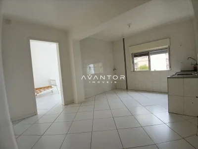 Cozinha integrada à sala com janela — Apartamento com 2 quartos para alugar em Centro, Santa Maria/RS
