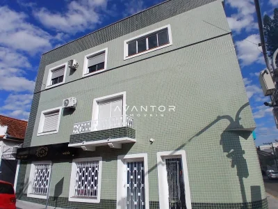 Fachada do prédio com sacada — Apartamento com 2 quartos para alugar em Centro, Santa Maria/RS