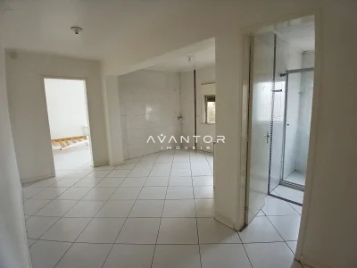Suíte com banheiro e closet integrados — Apartamento com 2 quartos para alugar em Centro, Santa Maria/RS
