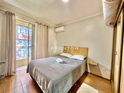 Dormitório com sacada e ar condicionado — Apartamento com 1 quarto à venda em Centro, Santa Maria/RS