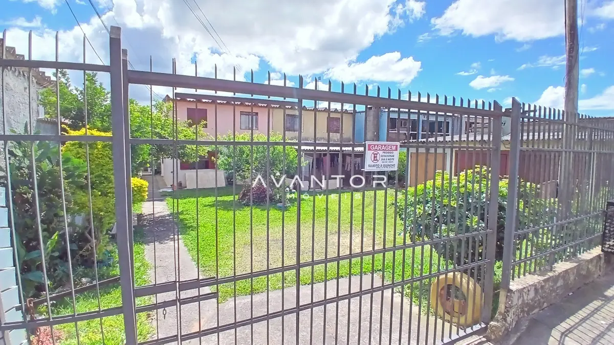 Fachada do terreno com portão — Apartamento com 2 quartos à venda em Tancredo Neves, Santa Maria/RS