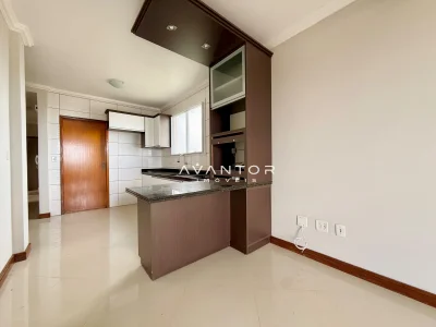 Cozinha com armários planejados e bancada — Apartamento com 3 quartos à venda em Dom Antônio Reis, Santa Maria/RS