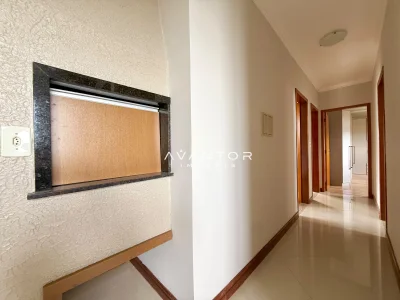 Hall de entrada com portas de madeira — Apartamento com 3 quartos à venda em Dom Antônio Reis, Santa Maria/RS