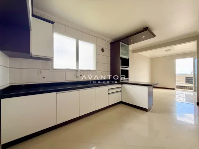 Cozinha com armários planejados — Apartamento com 3 quartos à venda em Dom Antônio Reis, Santa Maria/RS