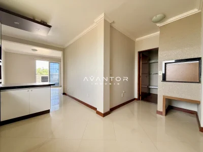 Sala integrada à cozinha com sacada — Apartamento com 3 quartos à venda em Dom Antônio Reis, Santa Maria/RS