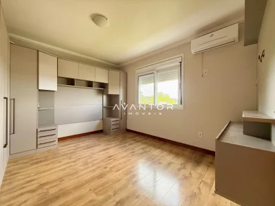 Suíte com armários planejados — Apartamento com 3 quartos à venda em Dom Antônio Reis, Santa Maria/RS