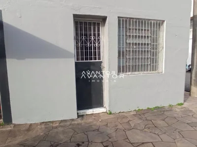 Fachada da casa com porta e janelas — Sala Comercial com 1 sala para alugar em Nossa Senhora do Rosário, Santa Maria/RS