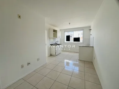 Cozinha integrada à sala de estar — Apartamento à venda no Residencial Raquel, em Nossa Senhora do Rosário, Santa Maria/RS
